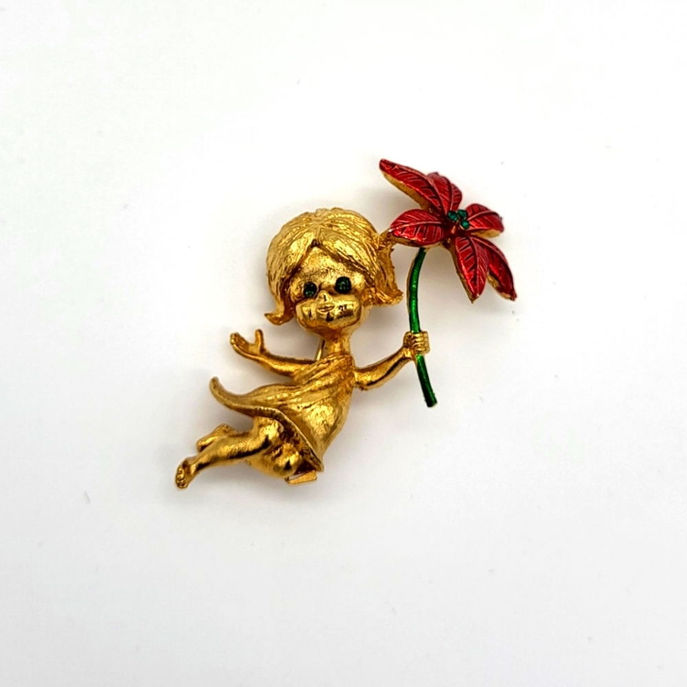 Vintage little girl holding a flower pin